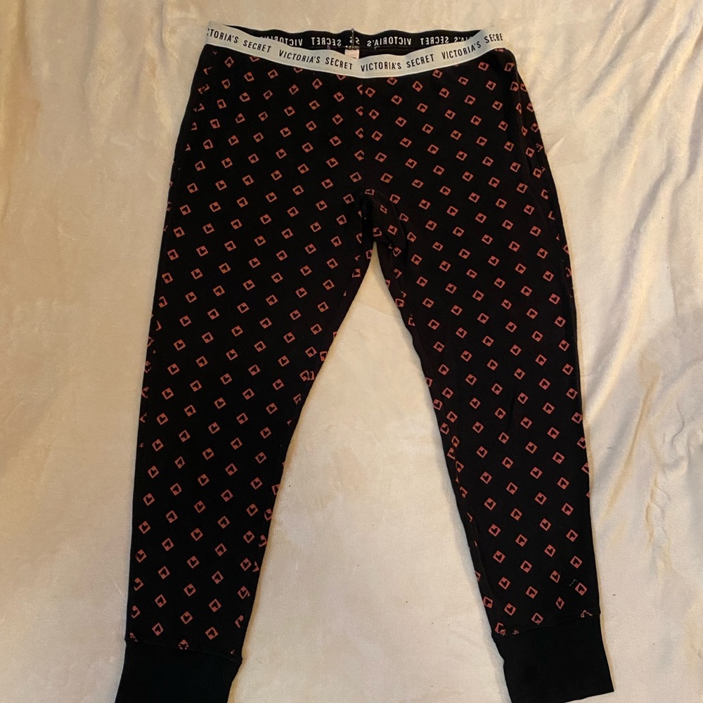 Victoria Secret black/pink patterned thermal pajama pants.